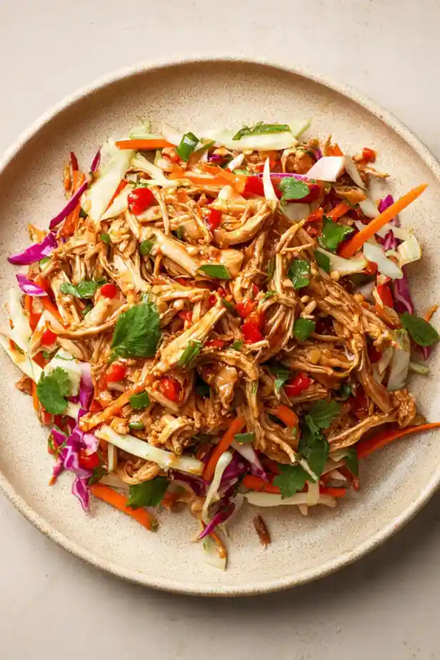 Asian-Inspired Pulled Chicken with Sriracha Peanut Slaw